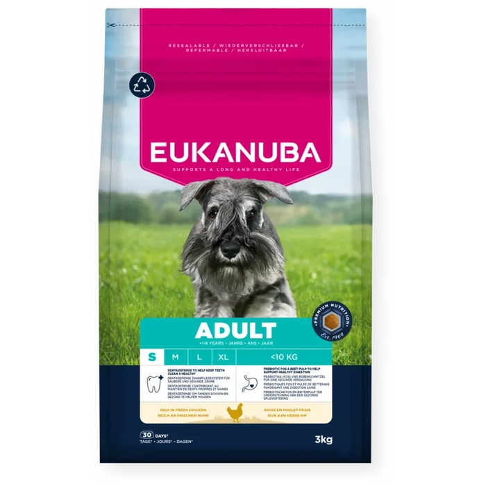 Eukanuba dog food package with a dog on a grassy background