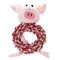 A plush pig dog toy with a spiral tail and a knotted red and white rope toy designed to resemble a candy cane.